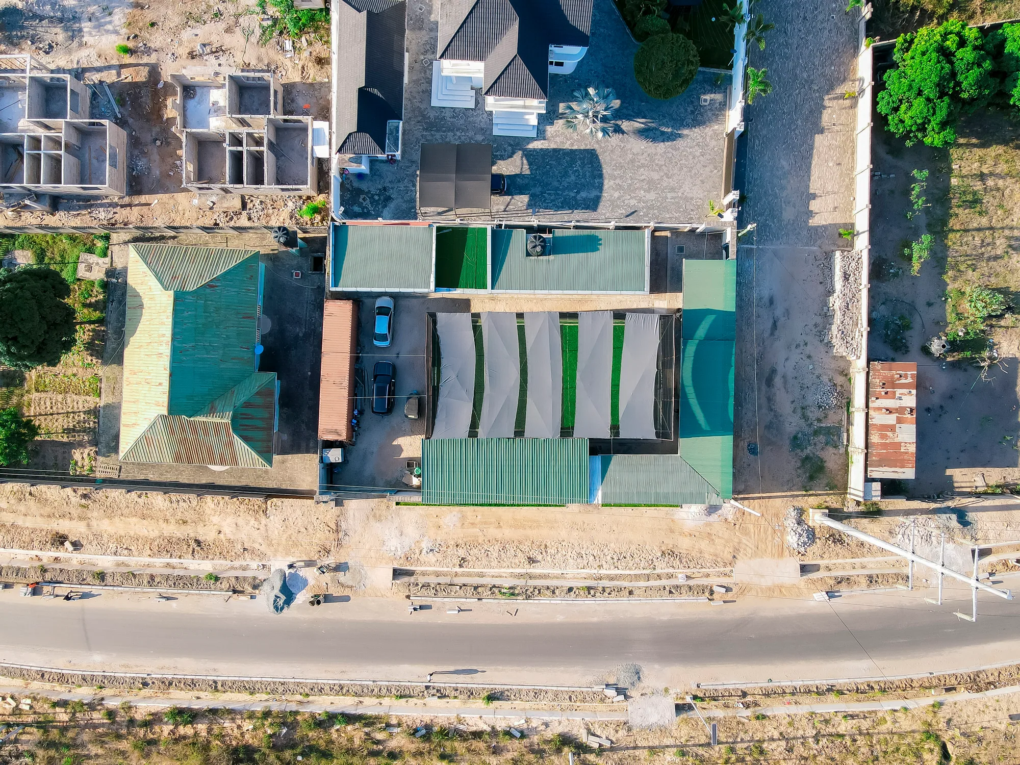 Overhead drone photograph of the Kibada Soccer Pitch grounds