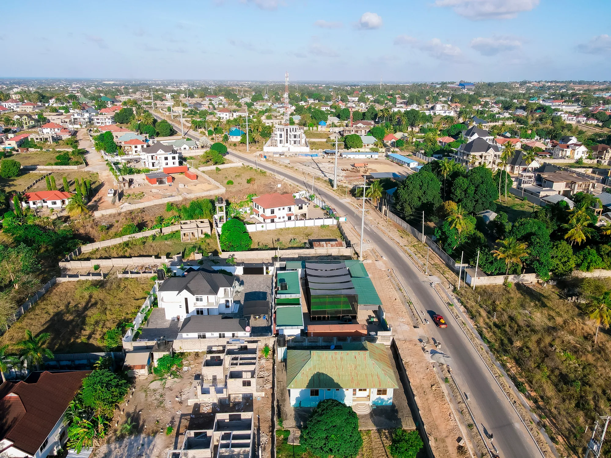 Aerial view of Kibada Soccer Pitch beside the neighbourhood road